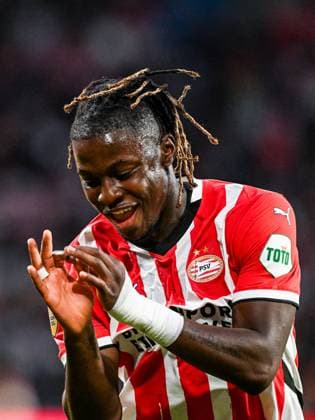 EINDHOVEN - Johan Bakayoko of PSV Eindhoven celebrates the 1-0 during the Dutch Eredivisie match between PSV Eindhoven and RKC Waalwijk at Phillips Stadium on August 10, 2024 in Eindhoven, Netherlands. ANP OLAF KRAAK Dutch Eredivisie 2024 25 xVIxANPxSportx xxANPxIVx 505720507 originalFilename: 505720507.jpg