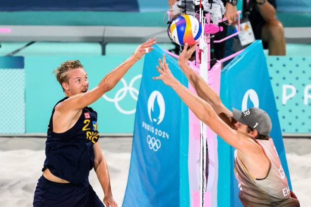240810 Jonatan Hellvig of Sweden and Nils Ehlers of Germany in men s beach volleyball final between Sweden and Germany during day 15 of the Paris 2024 Olympic Games on August 10, 2024 in Paris Photo Joel Marklund BILDBYRAN kod JM LT0671 beachvolleyboll beach volleyball sandvolleyball olympic games olympics os ol olympiska spel olympiske leker paris 2024 paris os paris ol 15 bbeng final os final olympic final  Copyright: JOELxMARKLUND BB240810JM073
