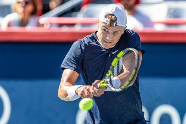 August 10, 2024, Montreal, Quebec, Canada: HOLGER RUNE from Denmark backhand hit in first set against Alexander Zverev from Germany in third round of Canadian Open at IGA Stadium in Montreal, Quebec, Canada Montreal Canada - ZUMAl189 20240810_zsp_l189_045 Copyright: xYannickxLegarex