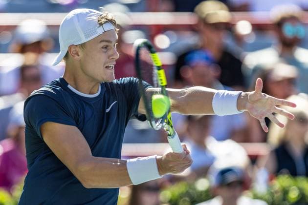 August 10, 2024, Montreal, Quebec, Canada: HOLGER RUNE from Denmark forehand hit in first set against Alexander Zverev from Germany in third round of Canadian Open at IGA Stadium in Montreal, Quebec, Canada. Ball on racket Montreal Canada - ZUMAl189 20240810_zsp_l189_047 Copyright: xYannickxLegarex