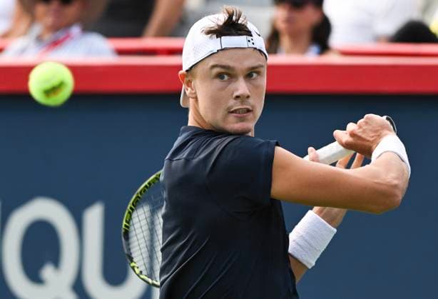August 10, 2024, Montreal, Pq, Canada: Holger Rune of Denmark plays a shot to Alexander Zverev of Germany during their third round match at the National Bank Open tennis tournament in Montreal, Saturday, August 10, 2024. Alexander Zverev, Holger Rune,  - ZUMAc35_ 20240810_zaf_c35_208 Copyright: xGrahamxHughesx