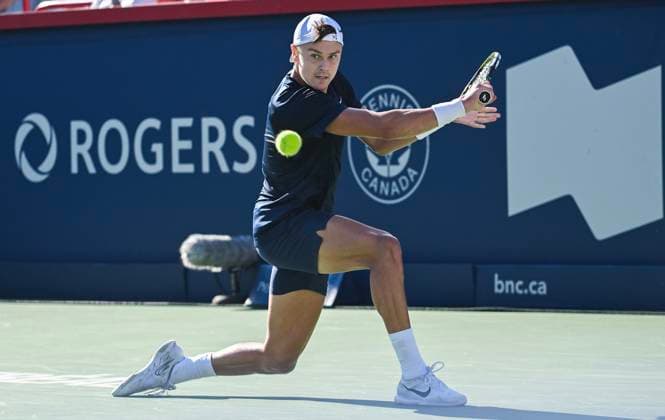 August 10, 2024, Montreal, Pq, Canada: Holger Rune of Denmark plays a shot to Alexander Zverev of Germany during their third round match at the National Bank Open tennis tournament in Montreal, Saturday, August 10, 2024. Alexander Zverev, Holger Rune,  - ZUMAc35_ 20240810_zaf_c35_209 Copyright: xGrahamxHughesx