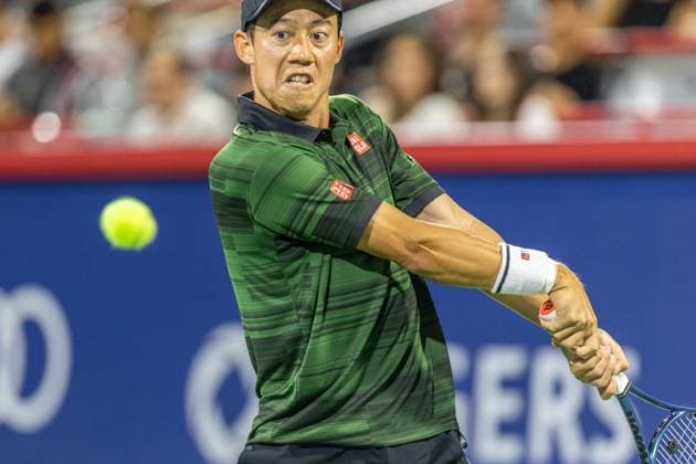 August 10, 2024, Montreal, Quebec, Canada: KEI NISHIKORI from Japan backhand shot in first set against Matteo Arnaldi from Italia in quarter final of Canadian Open at IGA Stadium in Montreal, Quebec, Canada Montreal Canada - ZUMAl189 20240810_zsp_l189_085 Copyright: xYannickxLegarex