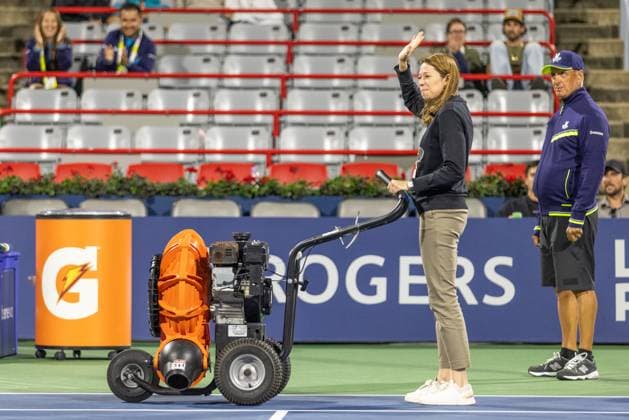August 10, 2024, Montreal, Quebec, Canada: VALERIE TETREAULT, tournament director drying court after rain during Matteo Arnaldi from Italia and Kei Nishikori from Japan in quarter final of Canadian Open at IGA Stadium in Montreal, Quebec, Canada Montreal Canada - ZUMAl189 20240810_zsp_l189_089 Copyright: xYannickxLegarex
