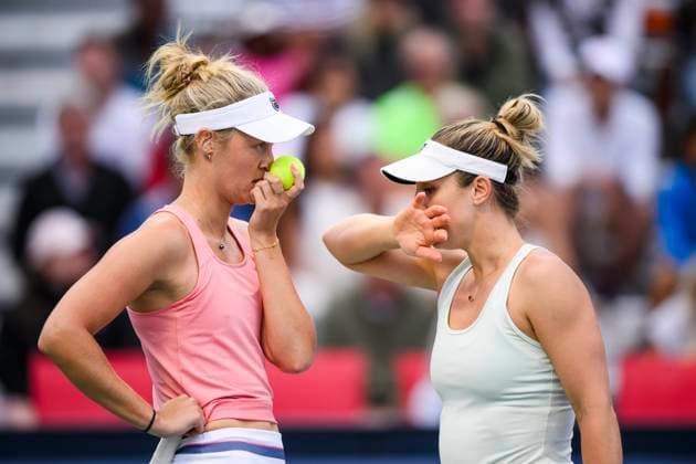 August 10, 2024, Toronto, On, Canada: Erin Routliffe of New Zealand (left) confers with Gabriela Dabrowski of Canada during their match against Ariana Arseneault of Canada and Mia Kupres of Canada at the National Bank Open in Toronto on Saturday August 10, 2024. Canada News - August 10, 2024  - ZUMAc35_ 20240810_zaf_c35_304 Copyright: xChristopherxKatsarovx