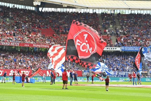 Flag waver with FCN flag,flag football 2 Bundesliga 1 FC Nuernberg FC Schalke 04 3 1 2 Matchday on 10 08 2023 Max Morlock Stadium Nuernberg, Season 2024 25