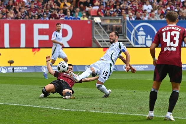 Goal chance Kenan KARAMAN FC Schalke 04 , action,duel against Danilo SOARES 1 FC Nuernberg , penalty area scene Soccer 2 Bundesliga 1 FC Nuernberg FC Schalke 04 3 1 2 Matchday on 10 08 2023 Max Morlock Stadion Nuernberg, Season 2024 25