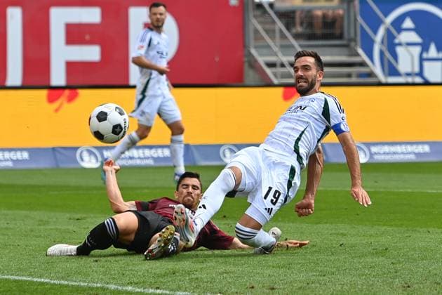 Goal chance Kenan KARAMAN FC Schalke 04 , action,duel against Danilo SOARES 1 FC Nuernberg , penalty area scene Soccer 2 Bundesliga 1 FC Nuernberg FC Schalke 04 3 1 2 Matchday on 10 08 2023 Max Morlock Stadion Nuernberg, Season 2024 25