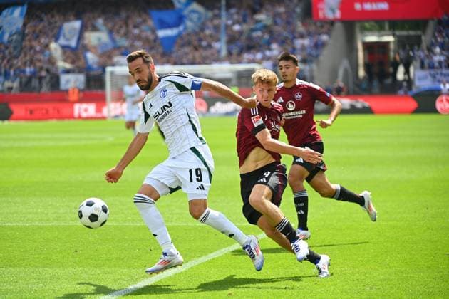 Kenan KARAMAN FC Schalke 04 , action,duel against Finn JELTSCH 1 FC Nuernberg Football 2 Bundesliga 1 FC Nuernberg FC Schalke 04 3 1 2 Matchday on 10 08 2023 Max Morlock Stadion Nuernberg, Season 2024 25