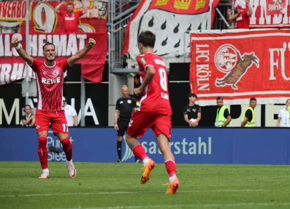 10 08 2024, xmohx, Soccer 2 Bundesliga, SV Elversberg 1 FC Köln emspor, v l Leart Paqarada Köln, left cheers the 0 1 of Denis Huseinbasic DFL DFB REGULATIONS PROHIBIT ANY USE OF PHOTOGRAPHS as IMAGE SEQUENCES and or QUASI VIDEO Elversberg