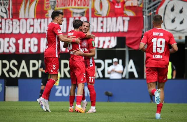 10 08 2024, xmohx, Soccer 2 Bundesliga, SV Elversberg 1 FC Köln emspor, f l Dejan Ljubicic 7 , scorer Denis Huseinbasic 8 and Leart Paqarada Köln celebrate the 0 1 DFL DFB REGULATIONS PROHIBIT ANY USE OF PHOTOGRAPHS as IMAGE SEQUENCES and or QUASI VIDEO Elversberg