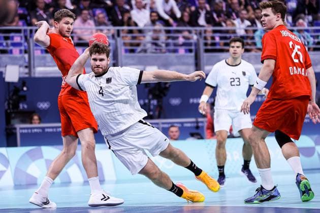 FRA, Olympic Games Paris 2024, Handball Mens Final, Germany GER vs Denmark DNK , 11 08 2024 Johannes Golla Germany 04 vs Jacobsen M Denmark 04 FRA, Olympic Games Paris 2024, Handball Mens Final, Germany GER vs Denmark DNK , 11 08 2024 Lille Copyright: xEibner-Pressefoto RogerxBuerkex EP_RBE