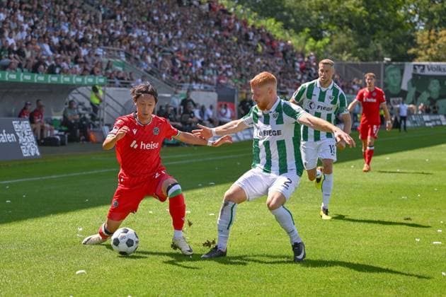11 08 2024, Football, 2 Bundesliga, 2 Matchday Season 2024 2025, Preußen Münster Hannover 96, Sei Muroya Hannover 96 , Mikkel Kirkeskov SC Preussen Münster xRHR PHOTO TKx Copyright: RHR-FOTOx RHR-FOTO TK