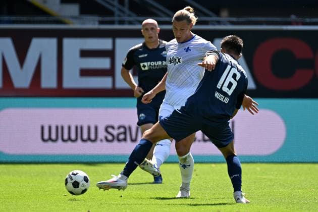 Paderborn, Home Deluxe Arena, 11 08 24, GER, Men, 2 Bundesliga, Saison 2024 2025, SC Paderborn 07 SV Darmstadt 98 Picture from left in duel Finn LAKENMACHER Darmstadt and Visar MUSLIU Paderborn Only for editorial use DFL regulations prohibit any use of photographs as image sequences and or quasi video NRW Germany
