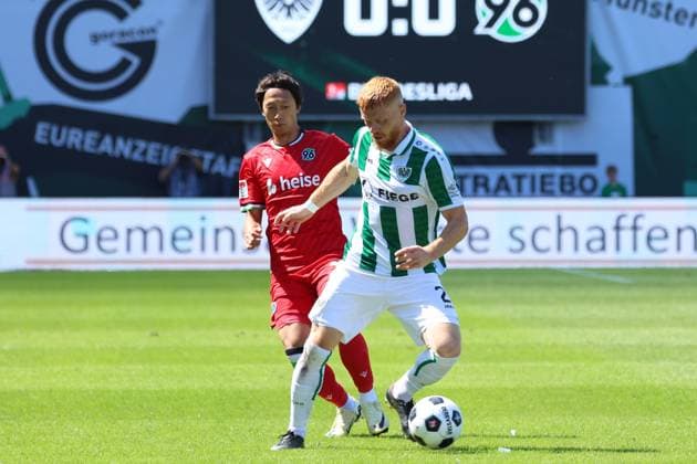 GER, Preussen Muenster vs Hannover 96, Football, 2 Liga, 2 Matchday, Season 2024 2025, 11 08 2024 Mikkel Kirkeskov Preussen Muenster, 2 Sei Muroya Hannover 96, 21 DFL REGULATIONS PROHIBIT ANY USE OF PHOTOGRAPHS AS IMAGE SEQUENCES AND OR QUASI VIDEO GER, Preussen Muenster vs Hannover 96, Football, 2 Liga, 2 Matchday, Season 2024 2025, 11 08 2024 Muenster Copyright: xEibner-Pressefoto xFrankxZeisingx EP_FZG