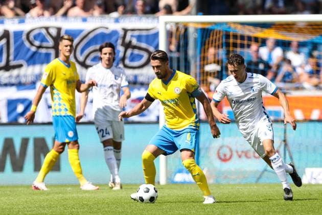 Ermin Bicakcic Eintracht Braunschweig,6 vs Martijn Kaars 1 FC Magdeburg,9 2 Soccer Bundesliga Season 2024 2025 Eintracht Braunschweig vs 1 FC Magdeburg at Eintracht Stadion in Braunschweig Action,Soccer,Man,Men,Germany,11 08 2024