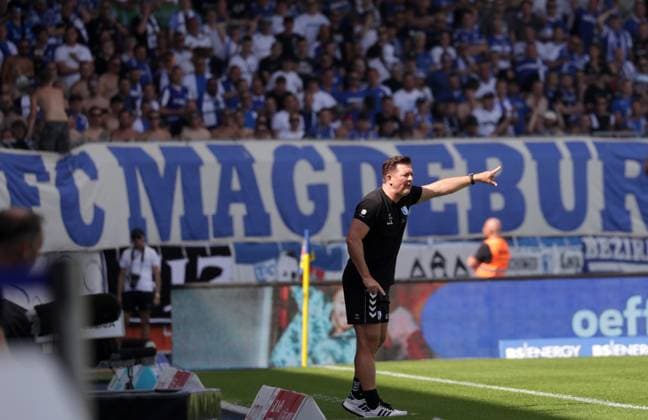 Head Coach Christian Titz 1 FC Magdeburg Football, Men, Season 2024 2025 2 BL, Eintracht Stadion, Eintracht Braunschweig vs 1 FC Magdeburg, 1 3 DFL REGULATIONS PROHIBIT ANY USE OF PHOTOGRAPHS AS IMAGE SEQUENCES AND OR QUASI VIDEO