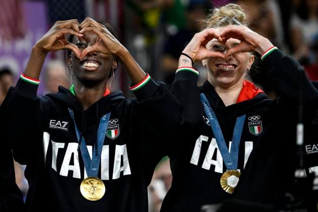 Paola Ogechi Egonu and Sarah Luisa Fahr of Italy celebrate at the end of the Volleyball gold medal match between United States of America and Italy of the Paris 2024 Olympic Games, Olympische Spiele, Olympia, OS at Arena Paris Sud 1 in Paris (France), August 11, 2024. Italy defeated United States 3-0 and won the gold medal.