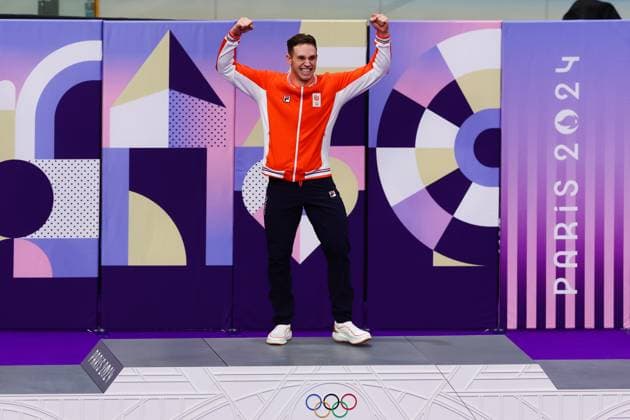 PARIS, FRANCE - AUGUST 11: Harrie Lavreysen of Team Netherlands celebrates winning Gold on the Podium in the Men™s Keirin Final during the Cycling Track Paris 2024 Olympic Games, Olympische Spiele, Olympia, OS at the National Veladrome on August 11, 2024 in Paris, France. (Photo by Pete Dovgan Speed Media Icon Sportswire) OLYMPICS: AUG 11 Paris 2024 EDITORIAL USE ONLY Icon2408110197