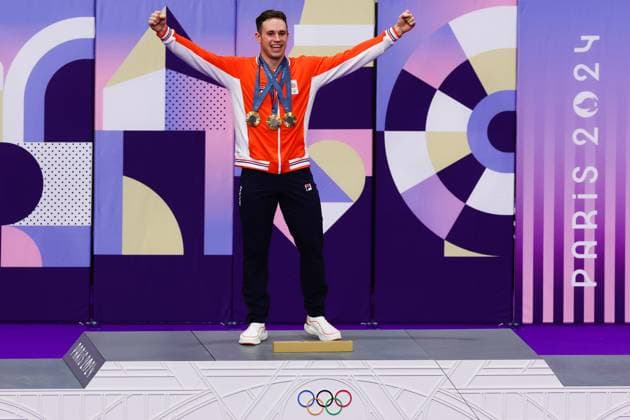 PARIS, FRANCE - AUGUST 11: Harrie Lavreysen of Team Netherlands celebrates winning Gold on the Podium in the Men™s Keirin Final during the Cycling Track Paris 2024 Olympic Games, Olympische Spiele, Olympia, OS at the National Veladrome on August 11, 2024 in Paris, France. (Photo by Pete Dovgan Speed Media Icon Sportswire) OLYMPICS: AUG 11 Paris 2024 EDITORIAL USE ONLY Icon2408110206