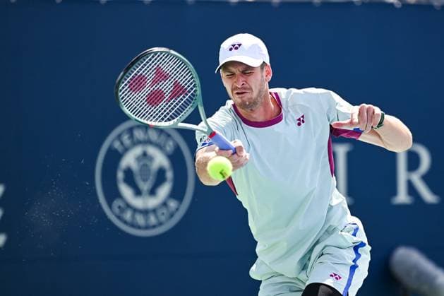MONTREAL, QC - AUGUST 11: Hubert Hurkacz (POL) returns the ball during a quarterfinal match at ATP, Tennis Herren National Bank Open on August 11, 2024 at IGA Stadium in Montreal, QC (Photo by David Kirouac Icon Sportswire) TENNIS: AUG 11 National Bank Open EDITORIAL USE ONLY Icon240811011