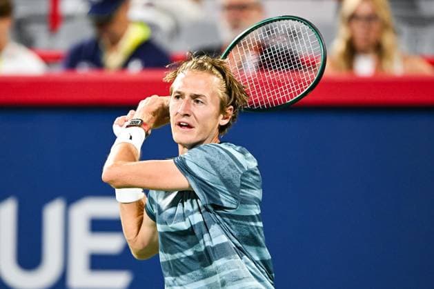 MONTREAL, QC - AUGUST 11: Sebastian Korda (USA) returns the ball during a semifinal match at ATP, Tennis Herren National Bank Open on August 11, 2024 at IGA Stadium in Montreal, QC (Photo by David Kirouac Icon Sportswire) TENNIS: AUG 11 National Bank Open EDITORIAL USE ONLY Icon240811041