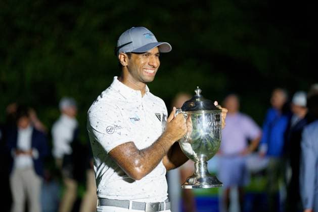 August 11, 2024, Greensboro, North Carolina, USA: AARON RAI holds his 1st place trophy after winning the 2024 Wyndham Championship at Sedgefield Country Club in Greensboro, NC. Greensboro USA - ZUMAb238 20240811_zsp_b238_015 Copyright: xJoshxBrownx