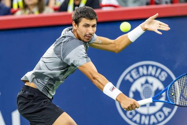 August 12, 2024, Montreal, Quebec, Canada: ALEXEI POPYRIN from Australia backhand hit in first set against Andrey Rublev in final of Canadian Open at IGA Stadium in Montreal, Quebec, Canada Montreal Canada - ZUMAl189 20240812_zsp_l189_010 Copyright: xYannickxLegarex