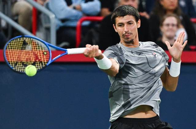 August 12, 2024, Montreal, Pq, Canada: Alexei Popyrin, of Australia, plays a shot to Andrey Rublev, of Russia, during the final of the National Bank Open men s tennis tournament in Montreal, Monday, Aug. 12, 2024. Alexei Popyrin, Andrey Rublev, - ZUMAc35_ 20240812_zaf_c35_132 Copyright: xGrahamxHughesx