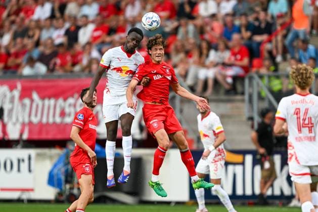 Champions League Qualifier Twente Enschede RB Salzburg on 13 08 2024 at De Grolsch Veste in Enschede Samson Baidoo Salzburg in a duel against Sam Lammers Enschede MT