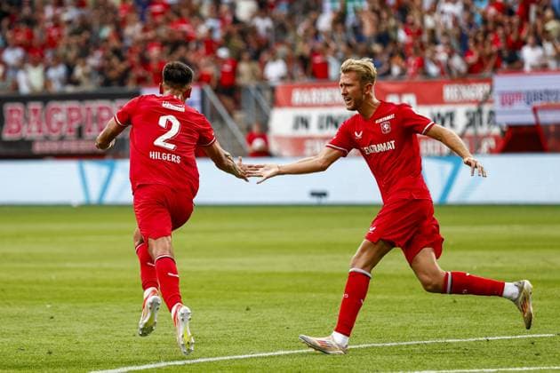 ENSCHEDE, 13-08-2024 , Stadium de Grolsch Veste, football, UEFA Champions League, qualification, season 2024 2025, during the match FC Twente - Salzburg, FC Twente player Mees Hilgers scores the 1-2 Twente - Salzburg  x26028429x Copyright:
