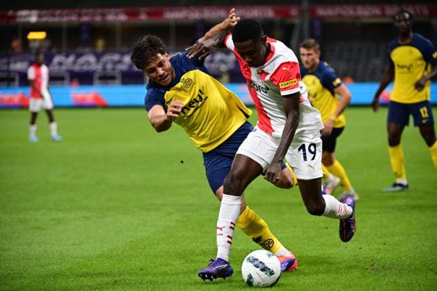 Union s Kevin Mac Allister and Slavia Prague s Oscar Dorley fight for the ball during a soccer game between Belgian Royale Union Saint-Gilloise and Czech SK Slavia Praha, on Tuesday 13 August 2024 in Anderlecht, Brussels, the return leg of the third qualifying round for the UEFA Champions League competition. Praha won the first leg 3-1. LAURIExDIEFFEMBACQ  x98416172x