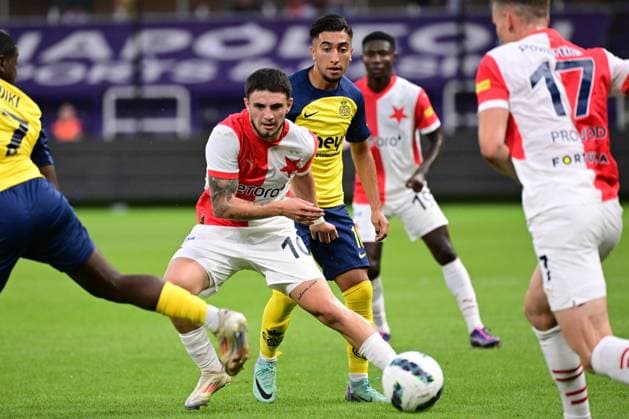 Slavia Prague s Christos Zafeiris and Union s Anouar Ait El Hadj fight for the ball during a soccer game between Belgian Royale Union Saint-Gilloise and Czech SK Slavia Praha, on Tuesday 13 August 2024 in Anderlecht, Brussels, the return leg of the third qualifying round for the UEFA Champions League competition. Praha won the first leg 3-1. LAURIExDIEFFEMBACQ  x98416502x