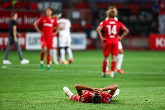 ENSCHEDE - Anass Salah-Eddine of FC Twente is disappointed with the loss during the UEFA Champions League preliminary round match between FC Twente and FC Salzburg at Stadion De Grolsch Veste on August 13, 2024 in Enschede, Netherlands. ANP VINCENT JANNINK UEFA Champions League Third qualifying round second leg 2024 25 xVIxANPxSportx xxANPxIVx 505940798 originalFilename: 505940798.jpg