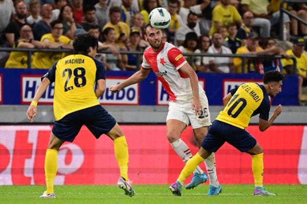 Union s Koki Machida, Slavia Prague s Tomas Chory and Union s Anouar Ait El Hadj fight for the ball during a soccer game between Belgian Royale Union Saint-Gilloise and Czech SK Slavia Praha, on Tuesday 13 August 2024 in Anderlecht, Brussels, the return leg of the third qualifying round for the UEFA Champions League competition. Praha won the first leg 3-1. LAURIExDIEFFEMBACQ  x98417246x