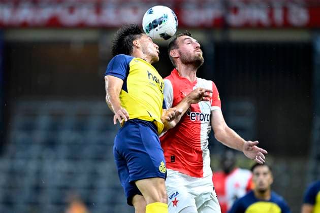 Union SG v Slavia Praha - UEFA Champions League BRUSSELS, BELGIUM - AUGUST 13 : Mac Allister Kevin defender of Royale Union Saint-Gilloise and Schranz Ivan forward of SK Slavia Praha jumping towards the ball during the UEFA Champions League Third qualifying round 2nd leg match between Union Saint-Gilloise and Slavia Praha at the RSC Anderlecht stadium on August 13, 2024 in Brussels, Belgium , 13 08 2024 Brussels Belgium  Copyright: xNicoxVereeckenx