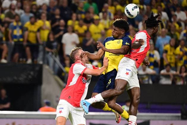 Slavia Prague s David Zima, Union s Kevin Rodriguez and Slavia Prague s Igoh Ogbu fight for the ball during a soccer game between Belgian Royale Union Saint-Gilloise and Czech SK Slavia Praha, on Tuesday 13 August 2024 in Anderlecht, Brussels, the return leg of the third qualifying round for the UEFA Champions League competition. Praha won the first leg 3-1. LAURIExDIEFFEMBACQ  x98418985x
