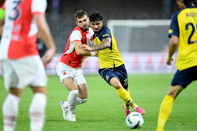Union SG v Slavia Praha - UEFA Champions League BRUSSELS, BELGIUM - AUGUST 13 : Puertas Castro Cameron midfielder of Royale Union Saint-Gilloise is challenged by Schranz Ivan forward of SK Slavia Praha during the UEFA Champions League Third qualifying round 2nd leg match between Union Saint-Gilloise and Slavia Praha at the RSC Anderlecht stadium on August 13, 2024 in Brussels, Belgium , 13 08 2024 Brussels Belgium  Copyright: xNicoxVereeckenx
