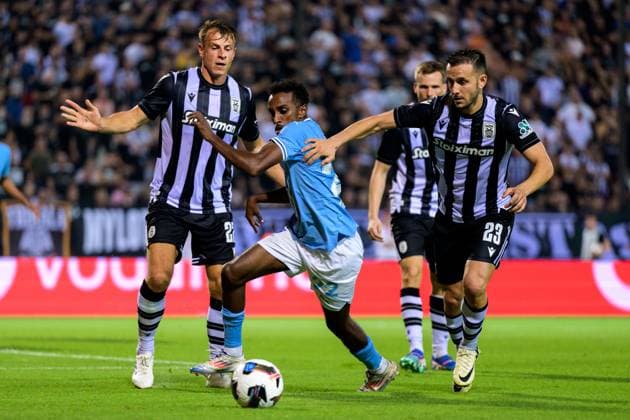 240813 Taha Ali of Malmö FF and Joan Sastre of PAOK during the UEFA Champions League football match between PAOK and Malmö FF on August 13, 2024 in Thessaloniki Photo Mathilda Ahlberg BILDBYRAN kod MA MA0703 fotboll football soccer fotball champions league paok malmö ff bbeng  Copyright: MATHILDAxAHLBERG BB240813MA093