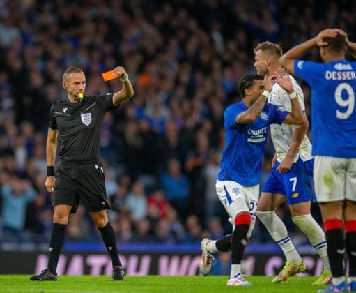 13th August 2024; Hampden Park, Glasgow, Scotland; Champions League Qualifying Football, Second Leg, Rangers versus Dynamo Kyiv; Jefte of Rangers reacts after he is given a second yellow card followed by a red card by referee Marco Guida after he jumps with Oleksandr Karavaiev of Dynamo Kyiv appearing to foul him  ActionPlus12681280 VagelisxGeorgariou
