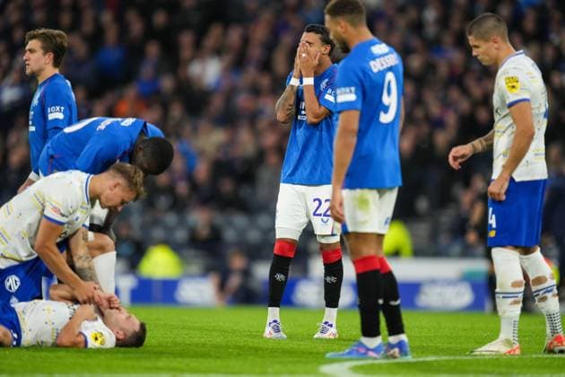 Jefte Vital Da Silva Dias of Rangers reacts after he was sent off for a second yellow card offence after Referee Marco Guida judged Jefte elbowed Oleksandr Karavaiev of Dynamo Kyiv during a headed challenge. Rangers v Dynamo Kyiv, UEFA Champions League, Third Qualifying Round, Second Leg, Football, Hampden Park, Glasgow, UK, 13 Aug 2024 EDITORIAL USE ONLY No use with unauthorised audio, video, data, fixture lists, club league logos or live services. Online in-match use limited to 120 images, no video emulation. No use in betting, games or single club league player publications. Copyright: xStuartxWallace Shutterstockx 14633326ac