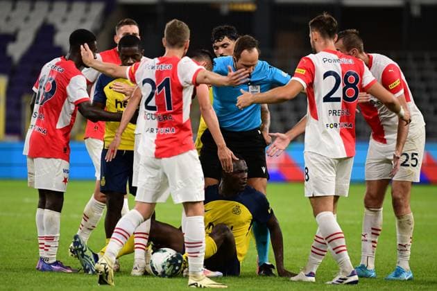Union s David Promise lies injured during a soccer game between Belgian Royale Union Saint-Gilloise and Czech SK Slavia Praha, on Tuesday 13 August 2024 in Anderlecht, Brussels, the return leg of the third qualifying round for the UEFA Champions League competition. Praha won the first leg 3-1. LAURIExDIEFFEMBACQ  x98419750x