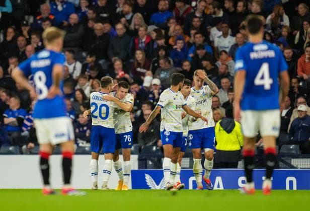 Oleksandr Pikhalono of Dynamo Kyiv celebrates with team mates after scoring to give Kyiv a 0-1 lead. Rangers v Dynamo Kyiv, UEFA Champions League, Third Qualifying Round, Second Leg, Football, Hampden Park, Glasgow, UK, 13 Aug 2024 EDITORIAL USE ONLY No use with unauthorised audio, video, data, fixture lists, club league logos or live services. Online in-match use limited to 120 images, no video emulation. No use in betting, games or single club league player publications. Copyright: xStuartxWallace Shutterstockx 14633326ba