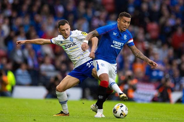 Oleksandr Karavayev of Dynamo Kyiv battles for the ball with Rangers captain James Tavernier during the Champions League qualifying match at Hampden Park, Glasgow. Rangers v Dynamo Kyiv, UEFA Champions League, Third Qualifying Round, Second Leg, Football, Hampden Park, Glasgow, UK, 13 Aug 2024 EDITORIAL USE ONLY No use with unauthorised audio, video, data, fixture lists, club league logos or live services. Online in-match use limited to 120 images, no video emulation. No use in betting, games or single club league player publications. Copyright: xKirkxO Rourke RangersxFC Shutterstockx 14635004ci