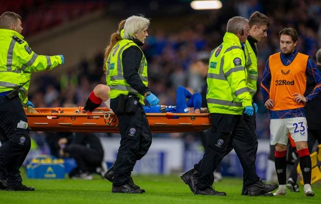 13th August 2024; Hampden Park, Glasgow, Scotland; Champions League Qualifying Football, Second Leg, Rangers versus Dynamo Kyiv; Ridvan Yilmaz of Rangers covers his face as he is stretchered off  ActionPlus12681364 VagelisxGeorgariou