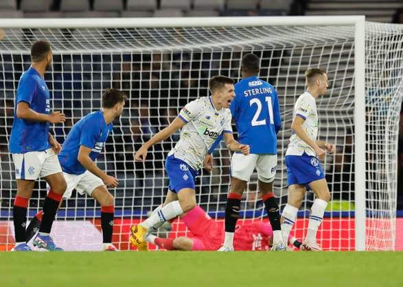 Rangers v FC Dynamo Kyiv UEFA Champions League Oleksandr Pikhalyonok of FC Dynamo Kyiv (middle) celebrates scoring his teams first goal during the UEFA Champions League Third Qualifying Round Second Leg match at Hampden Park, Glasgow UK Newspapers OUT Copyright: xFredxPalmerx FIL-20489-0102