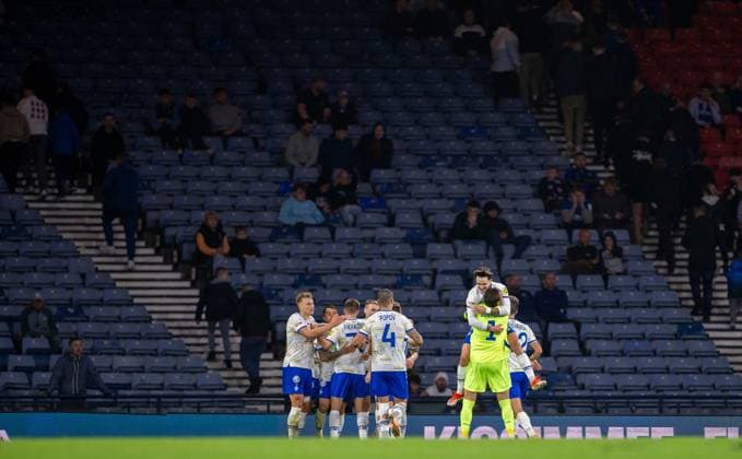 13th August 2024; Hampden Park, Glasgow, Scotland; Champions League Qualifying Football, Second Leg, Rangers versus Dynamo Kyiv; The Dynamo Kyiv players surround Nazar Voloshyn of Dynamo Kyiv in celebration after he scored to make it 0-2 in the 84th minute  ActionPlus12681403 VagelisxGeorgariou