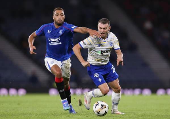 Football - 2024 2025 UEFA Champions League - Third Qualifying Round - Second Leg - Glasgow Rangers vs Dynamo Kyiv - Hampden Park - Tuesday 13th August 2024 Oleksandr Karavayev of Dynamo Kyiv vies with Cyriel Dessers of Rangers 