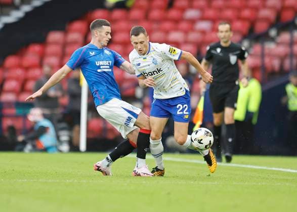 Rangers v FC Dynamo Kyiv UEFA Champions League Tom Lawrence of Rangers (left) is tackled by Vladyslav Kabayev of FC Dynamo Kyiv during the UEFA Champions League Third Qualifying Round Second Leg match at Hampden Park, Glasgow UK Newspapers OUT Copyright: xFredxPalmerx FIL-20489-0141