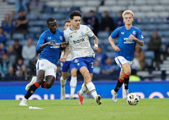Rangers v FC Dynamo Kyiv UEFA Champions League Mohammed Diomande of Rangers (left) and Mykola Shaparenko of FC Dynamo Kyiv compete for the ball during the UEFA Champions League Third Qualifying Round Second Leg match at Hampden Park, Glasgow UK Newspapers OUT Copyright: xFredxPalmerx FIL-20489-0148